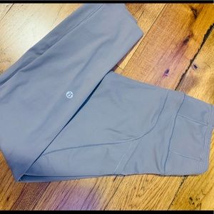 Gray Lululemon leggings in 23” with pockets. Size 6.